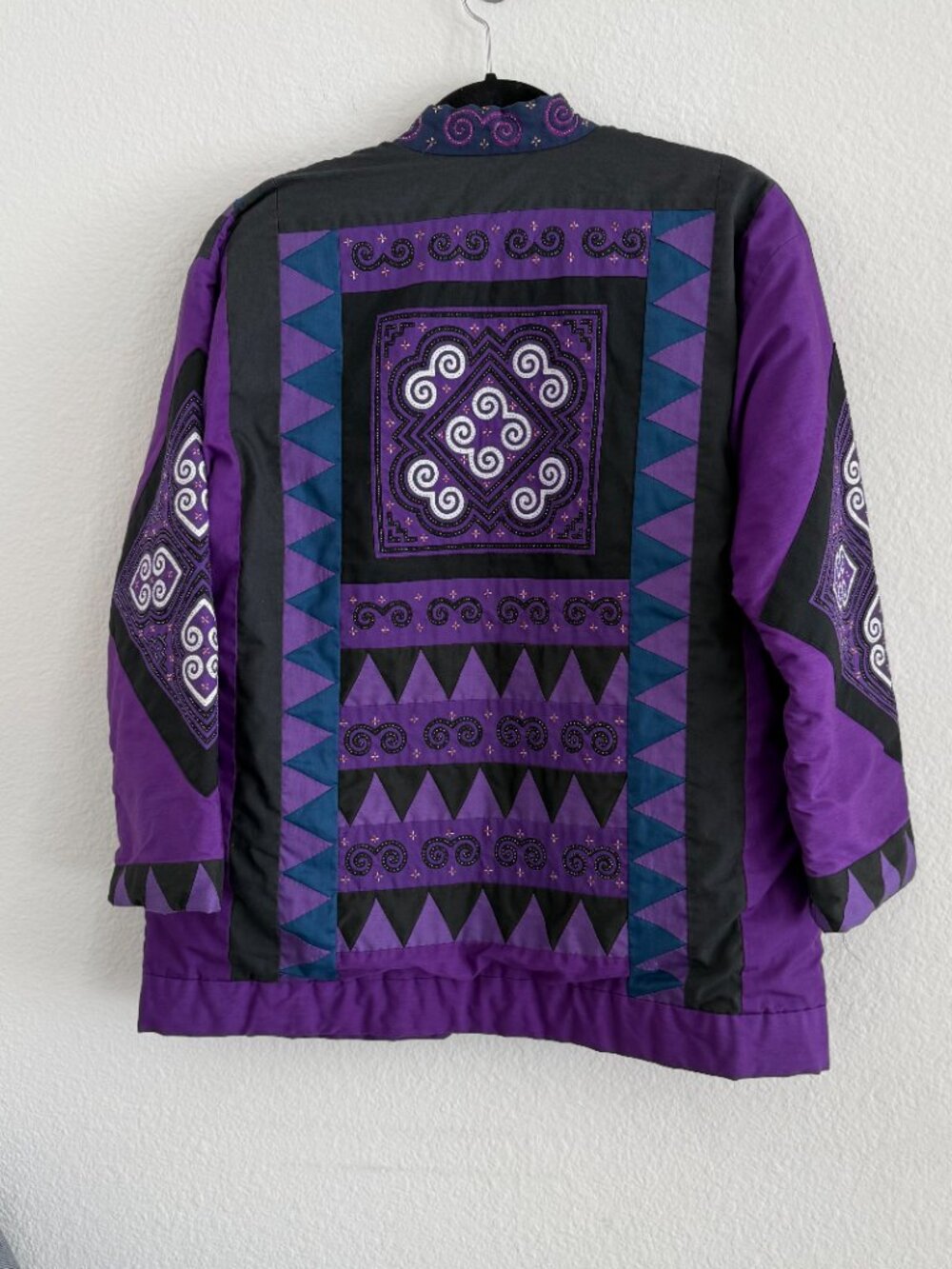 Purple symmetric design quilted jacket